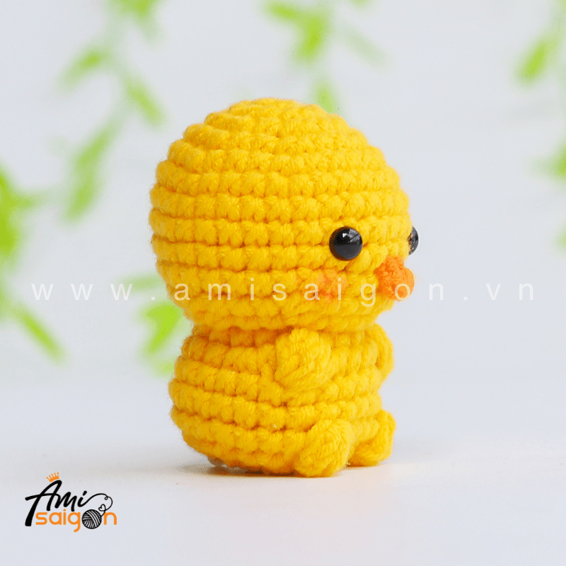 Side view of small chicken amigurumi free crochet pattern