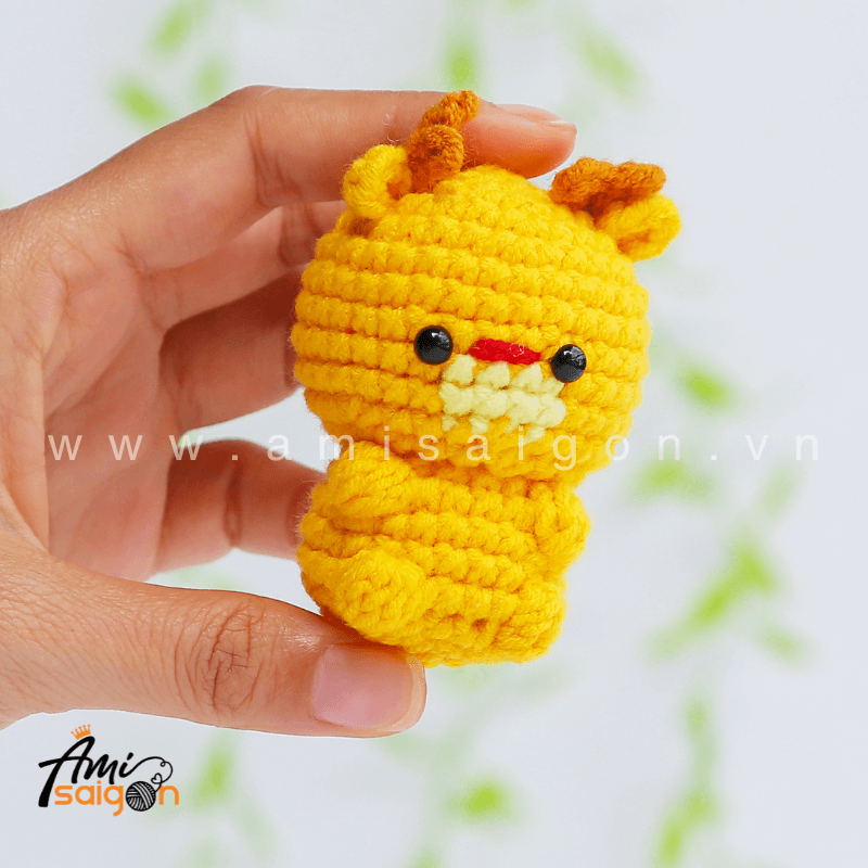 Finished No-Sew Amigurumi Small Reindeer held in hand